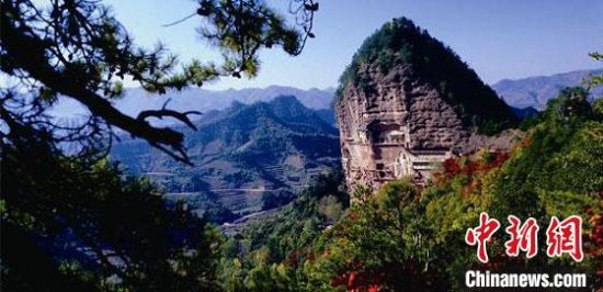 圖為世界文化遺產(chǎn)麥積山石窟。(資料圖)甘肅省文物局供圖