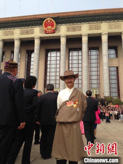 圖為2016年，尼瑪扎西出席全國政協(xié)會(huì)議(資料圖)。西藏農(nóng)科院 供圖